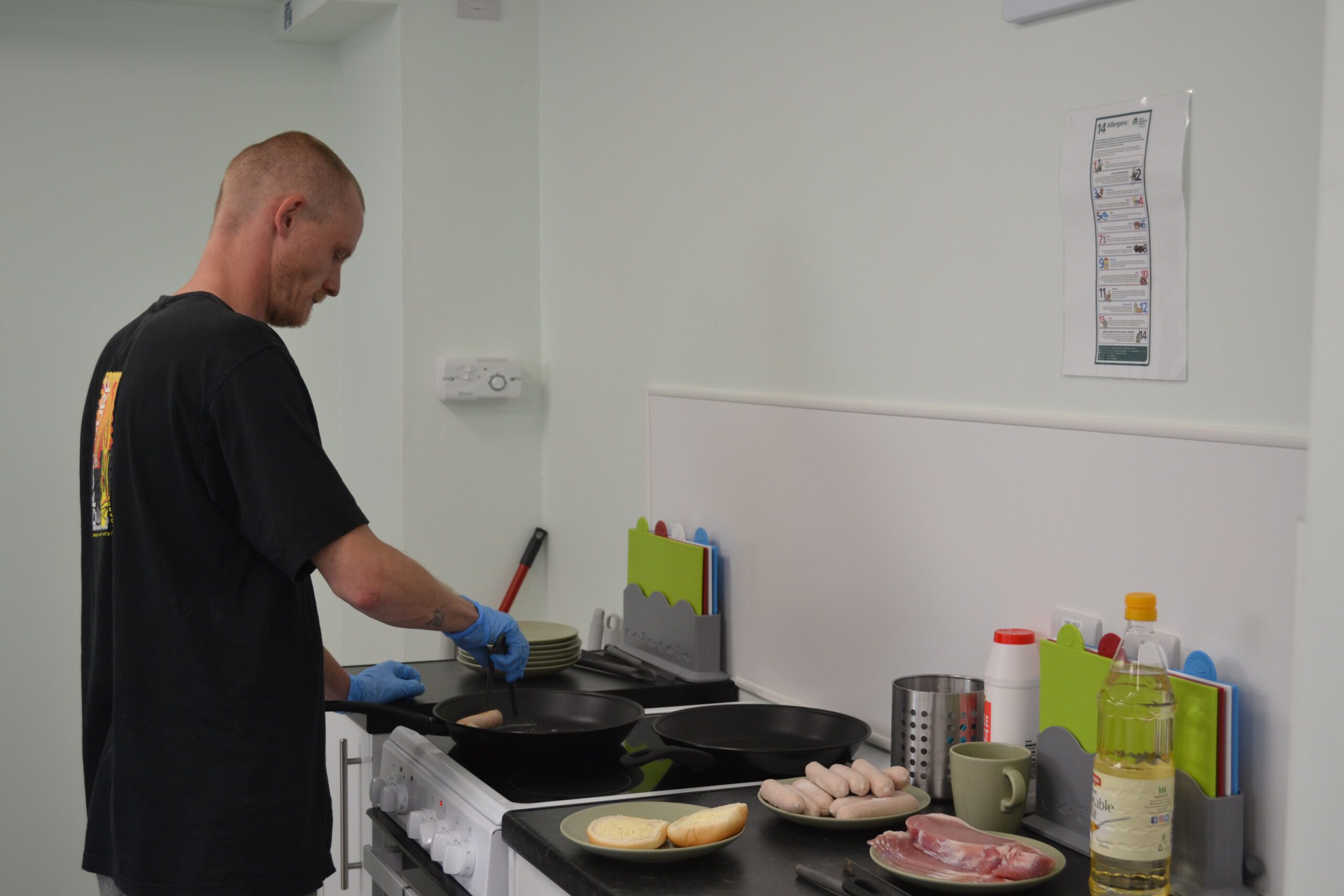 Man cooking in the Day Centre kitchen